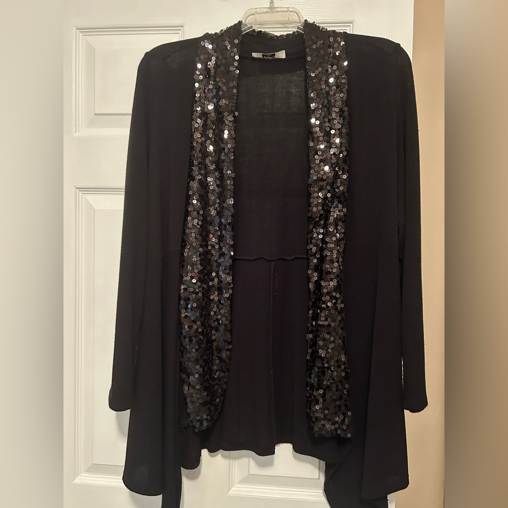 Women’s sweater with sequin trim